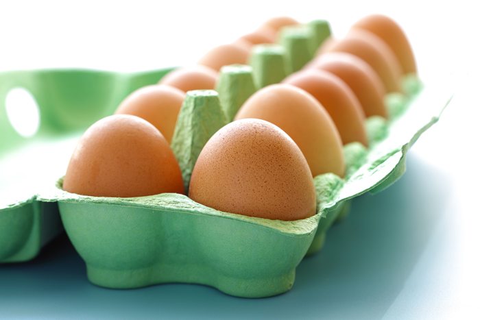 Dozen organic eggs in a box