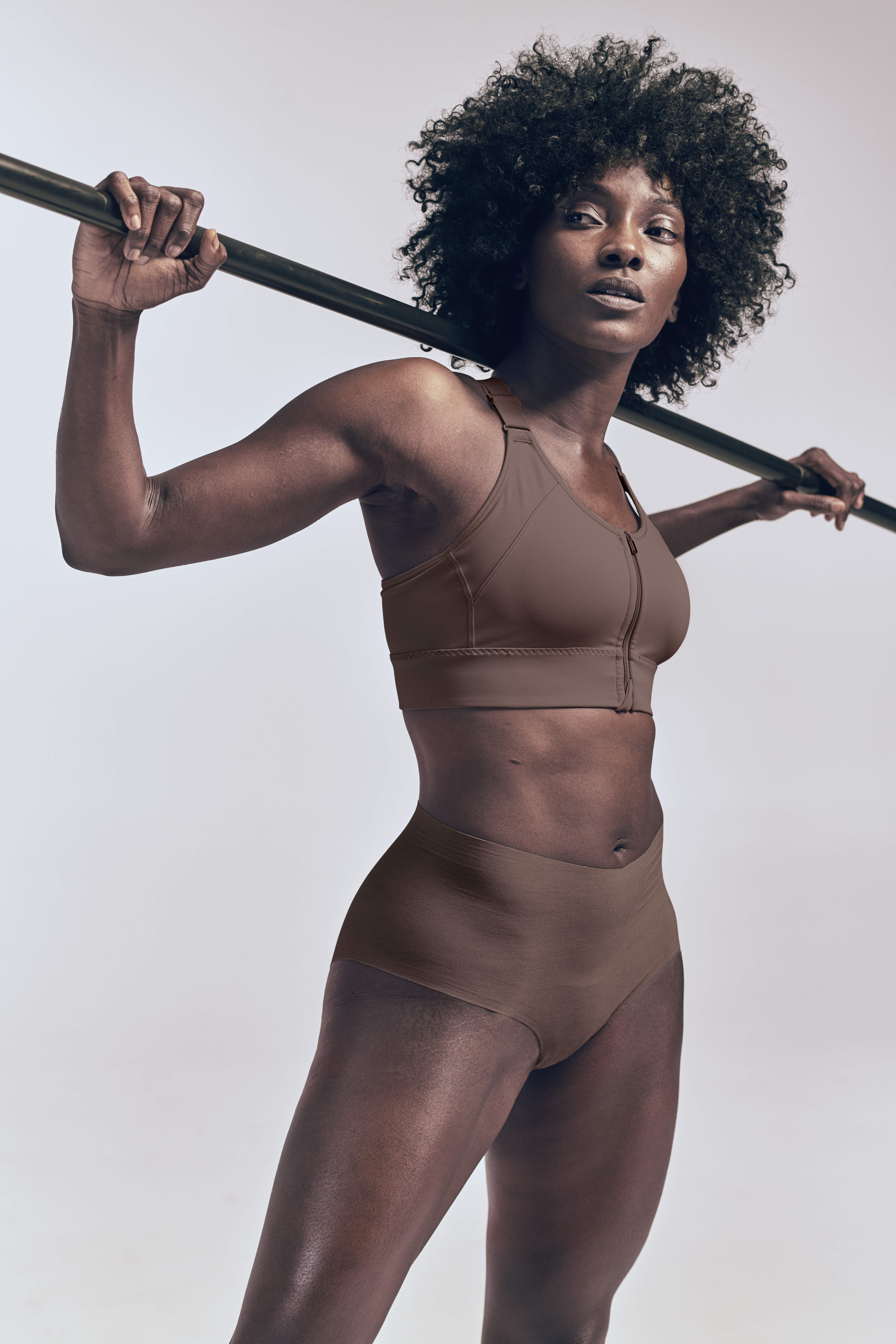 African-American female wearing the brown Athleta Empower Bra