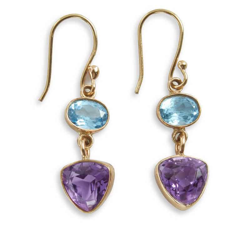 earrings to reflect designs by Charles Albert