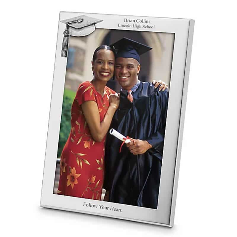 Cap and tassel adorned graduation frame