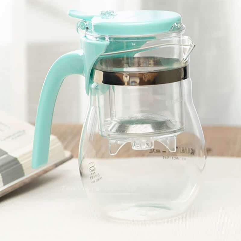 Glass infuser tea cup with stainless steel rim