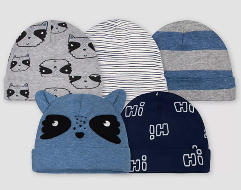 Pack of baby caps styled with raccoons and other designs