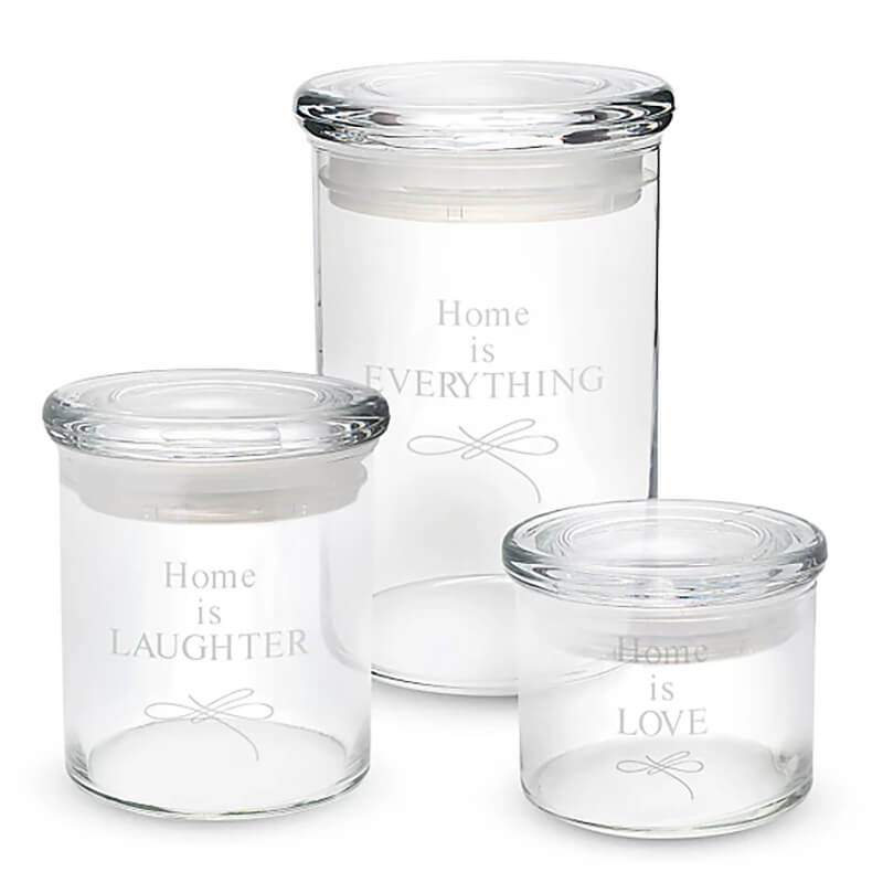 three personalized glass storage jars