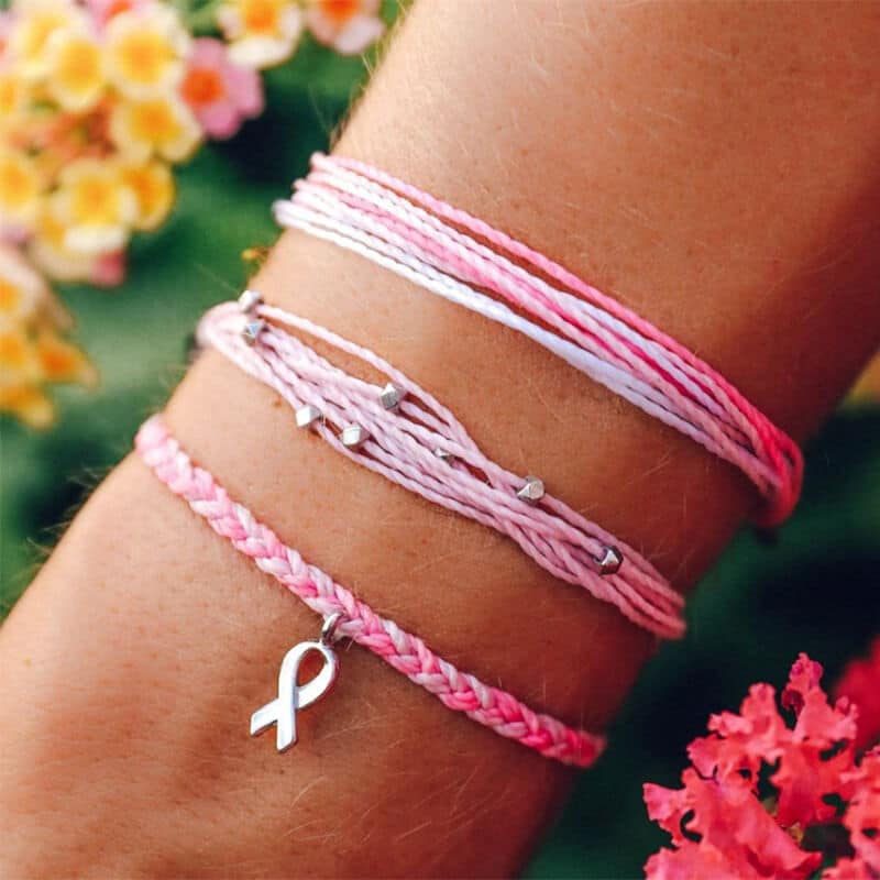 three pretty-in-pink breast cancer bracelets