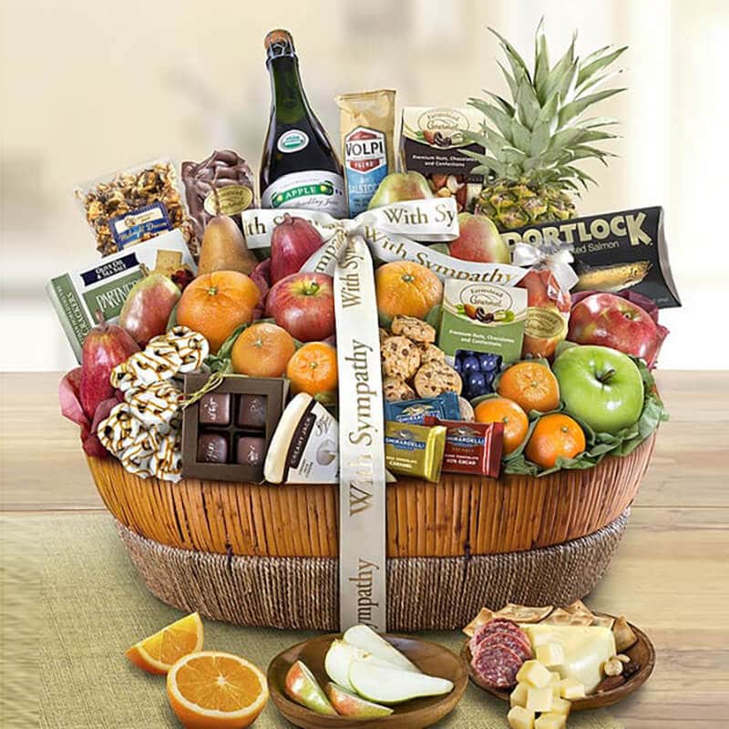 Fruit gift basket with chocolate and cookies